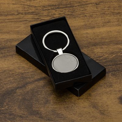 Chaveiro de metal redondo com chapa central X01655